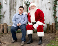 Maleeha and family with Santa 2024
